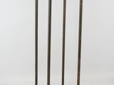 an image of a tall metal stand with four legs
