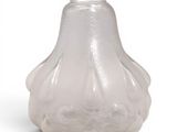 a glass vase that is sitting on a white surface