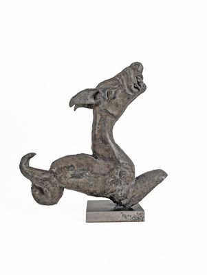 statue of a dog on a skateboard on a white background