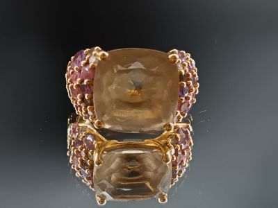 Bague en or jaune 18k 750/° ornée d'une citrine dans un ento…