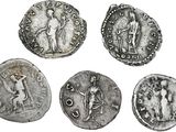six ancient roman coins, one of which is a man and one of which is a woman