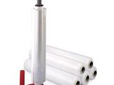 quatre rouleaux de plastique sur fond blanc