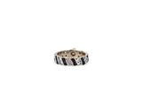 a close up of a ring on a white surface