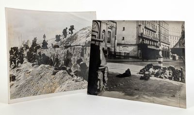 une vieille photo en noir et blanc montrant un groupe de soldats allongés par terre