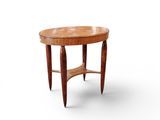 a round table with a wooden top and two legs