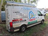 a van that is parked on the side of the road