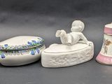 five different types of porcelain objects sitting on a table