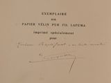 a black and white photo of a book with writing on it
