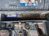 a tool box with tools inside of it on the floor