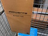 a carton with a box on top of it in a store