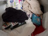 a white bag full of baby products and diapers