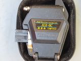 a black case with a digital device inside of it