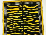 écharpe à imprimé zébré jaune et noir, ornée de pois