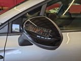 a close up of a mirror on a car ' s side view mirror