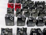 a lot of different type of switches on a white surface