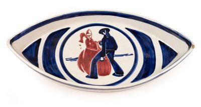 a blue and white plate with a picture of a man and a woman on it