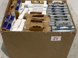 boxes of toothbrushes are stacked on top of each other in a cardboard box