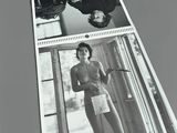 a black and white photo of a woman in underwear