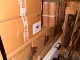 boxes stacked on top of each other in a storage room