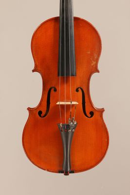 an old violin with a bow on a white background
