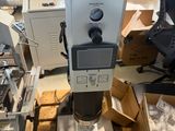 a machine that is sitting on a pallet in a warehouse