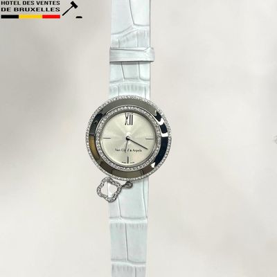 a watch that is sitting on top of a table