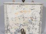 an old metal box with a lock on it
