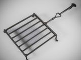 a black and white photo of a grill grate on a table