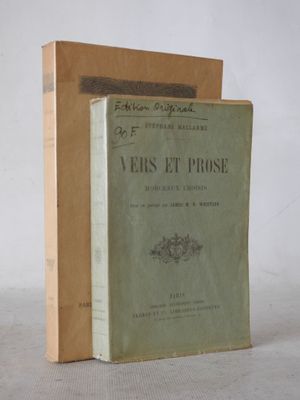 two books sitting on top of each other on a table