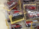 many different types of toy trucks in the box