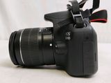 a close up of a camera with a lens attached to it