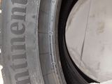 an image of a close up of a tire on a white surface