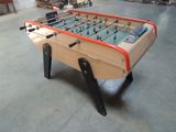 a foosball table in the middle of a room