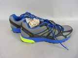 the shoe is gray and blue and has a yellow lace