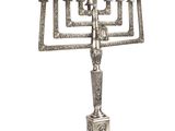 a large silver menorah with five candles on a stand