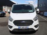 a white van that is parked in a parking lot