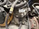 a lot of hoses that are sitting on the floor