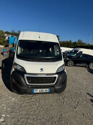 a white van that is parked in a parking lot