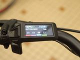 a close up view of a bike ' s handlebar with a digital display