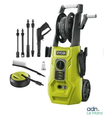 a green electric pressurer with tools and accessories on a white background
