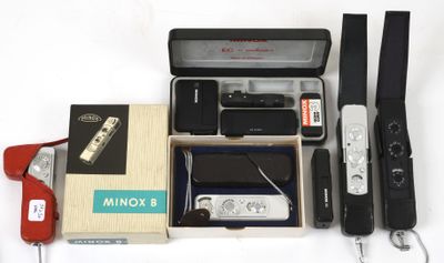 a box with various items in it on a white surface