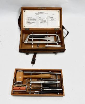 two different types of tools in a wooden case