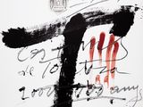a black and white drawing of a cross on a piece of paper