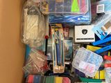a box full of school supplies that are in the box