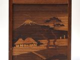 a picture of a picture of a mountain in a wood frame