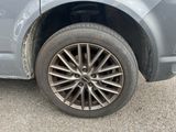a close up of a tire on a car ' s rim