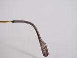 a close up of a pair of glasses on a white surface