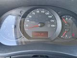 a close up of a car dashboard with a speedometer