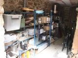 a room with a lot of items on the shelves