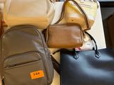 a lot of bags that are sitting on a table